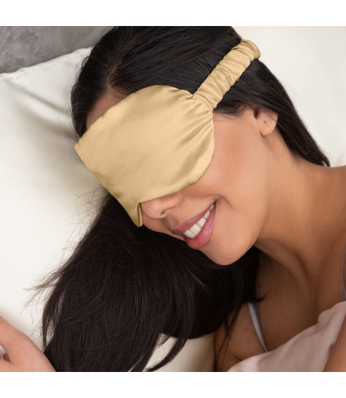 Sovmask siden „Sandstone“. Smycken