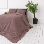 Påslakanset muslin „Brown muslin“. Påslakanset, 200x200 cm, 200x220 cm. Enfärgat varmt brunt bäddset med en diskret struktur