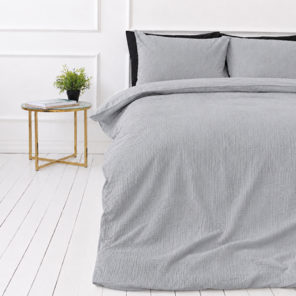 Påslakanset muslin „Grey muslin“. Påslakanset, 200x200 cm, 200x220 cm. Enfärgad silvergrå bäddning av strukturerad muslin