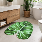 Badrumsmatta "Leaf mat", 58x88 cm. Färgstark badrumsmatta med stort tropiskt bladmotiv och mönster i gröna toner. Badrumsmatta "Leaf mat", 58x88 cm. Färgstark badrumsmatta med stort tropiskt bladmotiv och mönster i gröna toner.