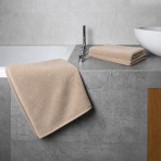 Badhandduk „Almond Softness“, 70x140 cm. Elegant ljusbrun handduk med subtilt mönster Badhandduk „Almond Softness“, 70x140 cm. Elegant ljusbrun handduk med subtilt mönster