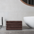 Badhandduk „Brown towel“, 50x100 cm, 70x140 cm. Handduk i enhetlig mörkbrun färg med subtil yta Badhandduk „Brown towel“, 50x100 cm, 70x140 cm. Handduk i enhetlig mörkbrun färg med subtil yta