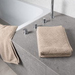 Badhandduk „Toffee towel“, 50x100 cm, 70x140 cm. Vikt handduk i krämig sandbeige nyans Badhandduk „Toffee towel“, 50x100 cm, 70x140 cm. Vikt handduk i krämig sandbeige nyans